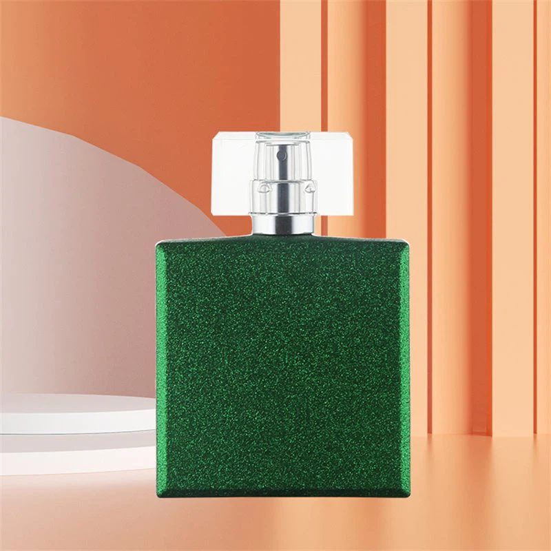 green glass perfume bottle
